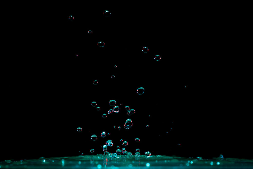 Air bubbles floating in water.